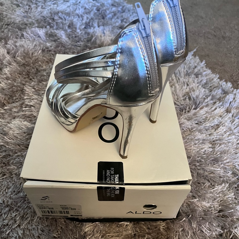 Aldo, silver heels worn only once. Just like new.